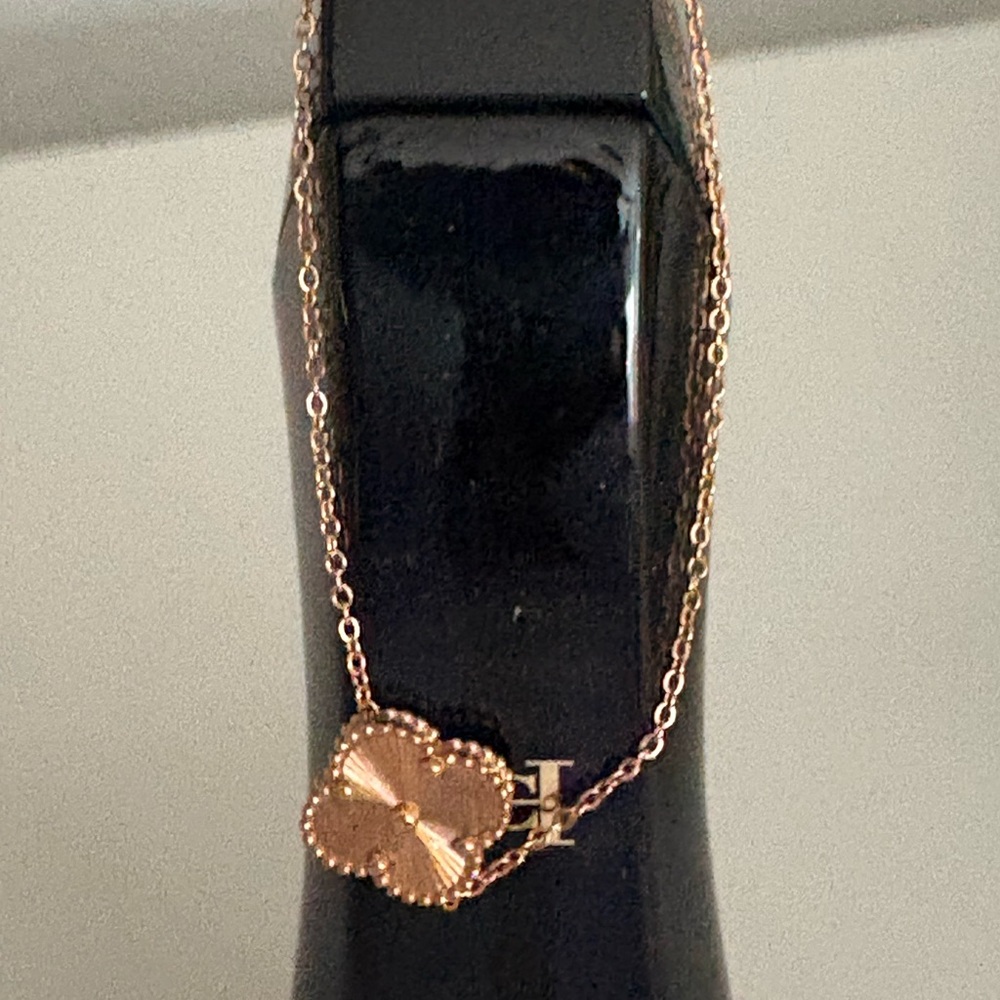 Elegant Designer Rose Gold Clover Bracelet.